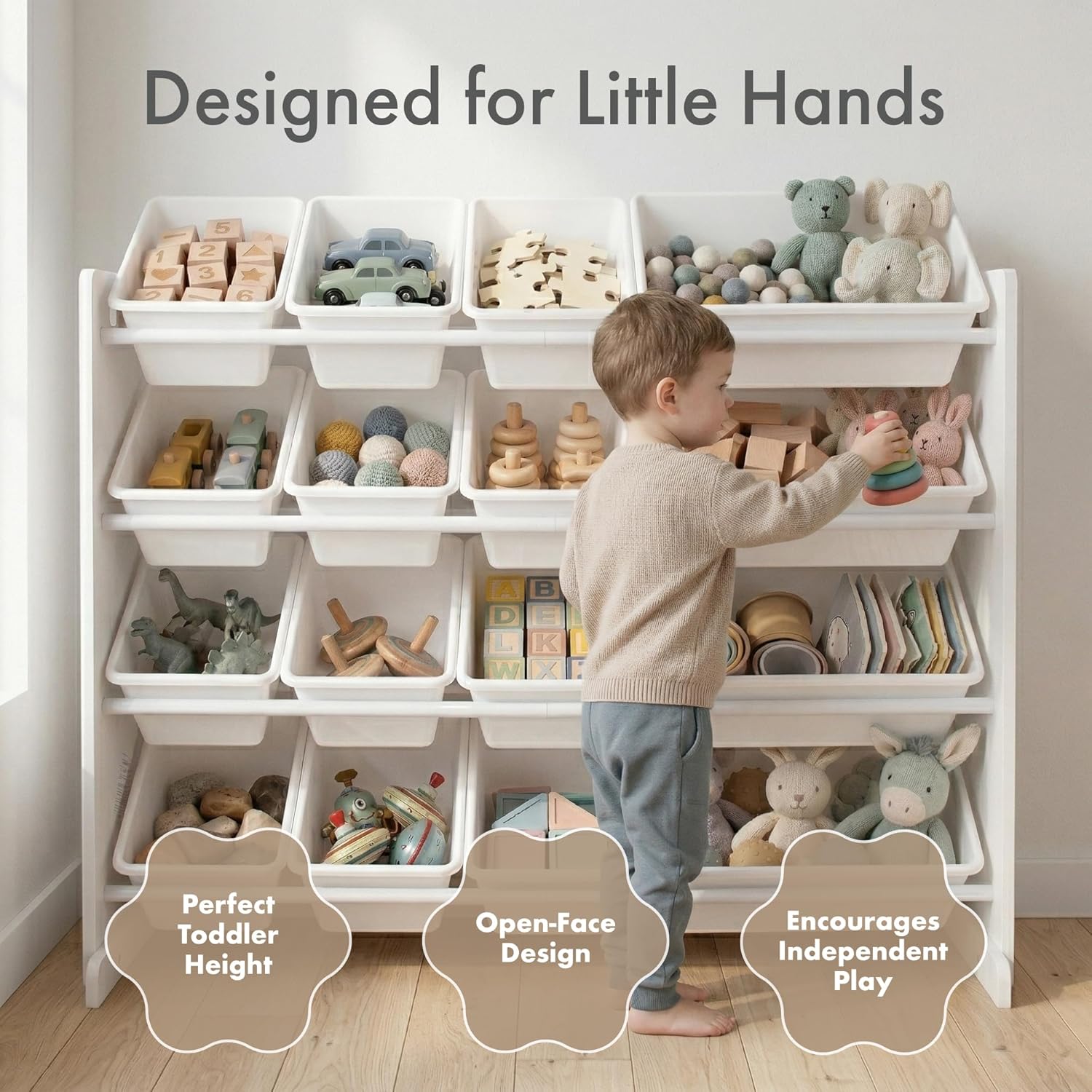 Child playing with toys on a white storage unit labeled 'Designed for Little Hands'.
