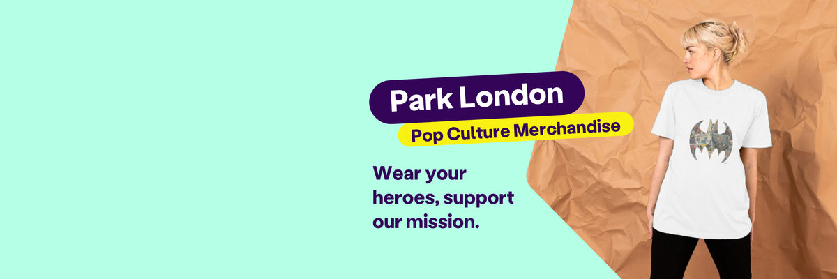 A light blue banner. It features an image of a woman wearing a white tshirt with the batman logo. The text reads: "Park London, pop culture merchandise. Wear your heroes, support our mission".